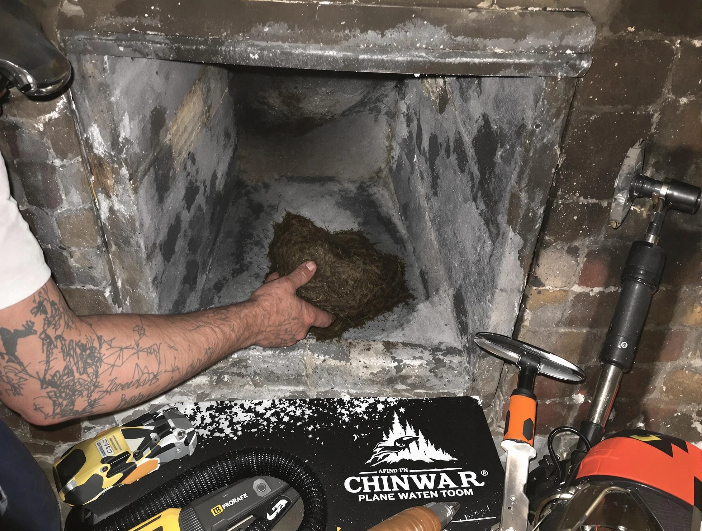 Parsippany Chimney Sweep safely removing debris and screening chimney in Parsippany, NJ